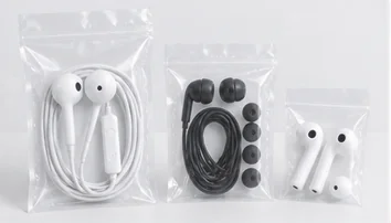 Earphones and accessories pictured with clear bags